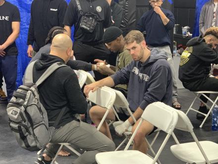 Fred Adams getting wrapped up