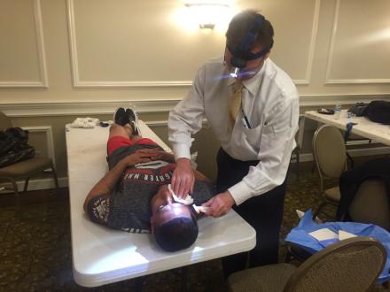 Josh getting stitched up by the doctor