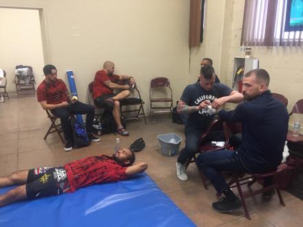 Chad George wrapping up Chase Gibson